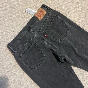 Black Levi’s 501s frayed hems